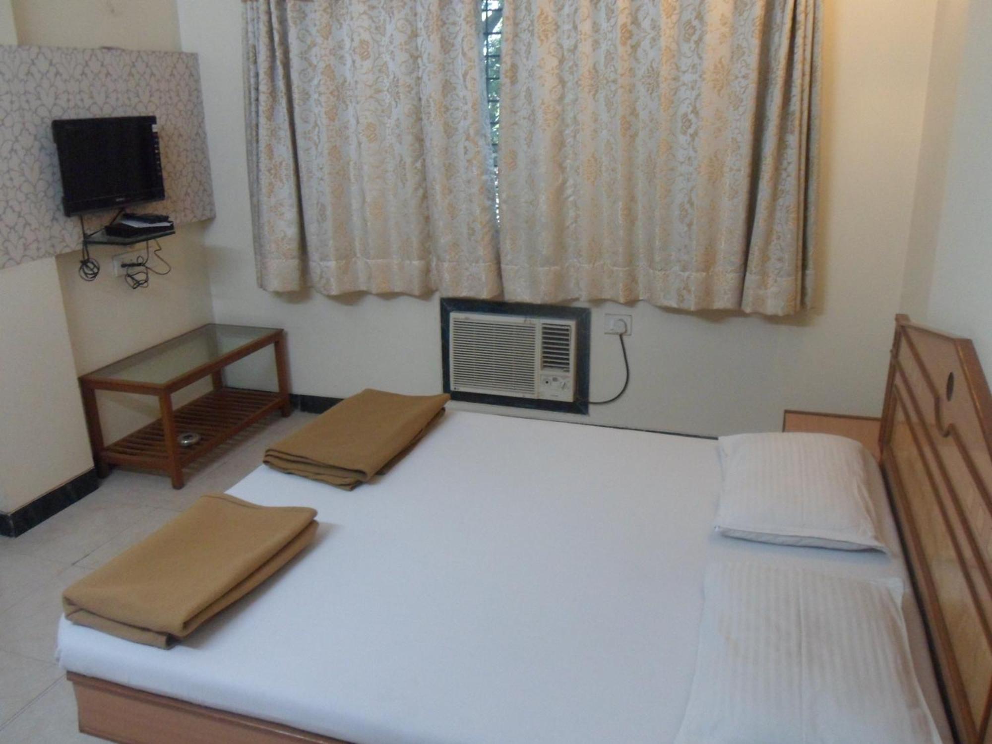 Hotel Pooja International Nászik Szoba fotó
